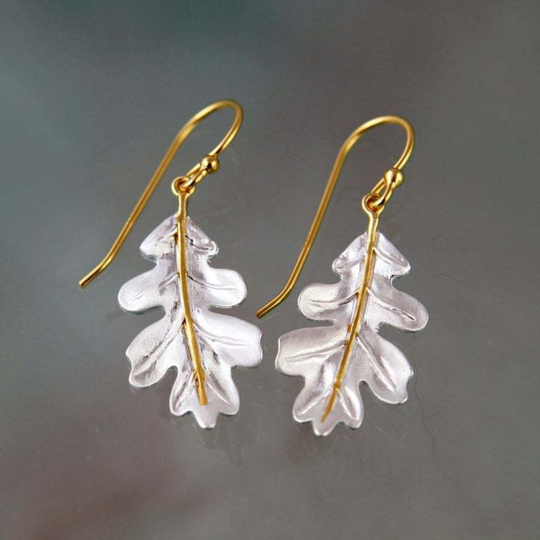 Boho earrings in gold with white leaves