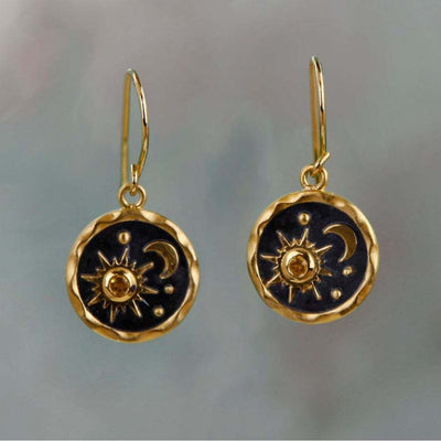 Earrings with sun and moon in gold and silver