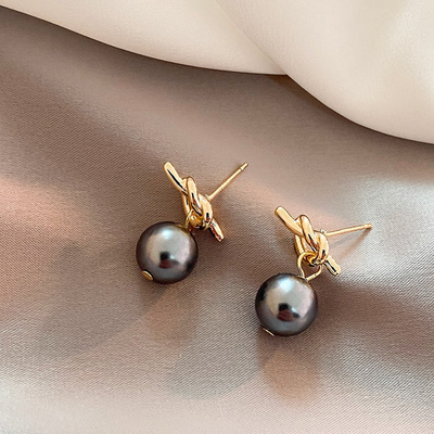 Elegant Pearl Bow Earrings